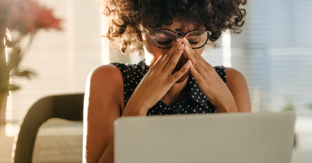 woman feeling stress in the workplace